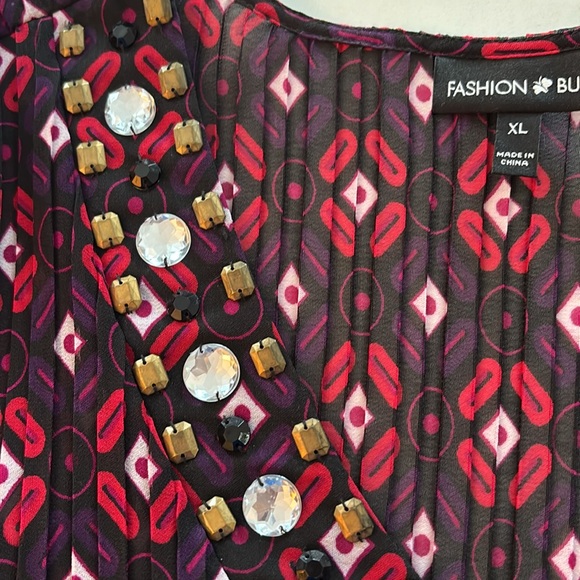 Red Patterned Top with Beaded Neckline. 3/4 length flared sleeves and flared hem - Picture 7 of 7